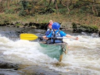 Canoeing along the Rapids.jpg